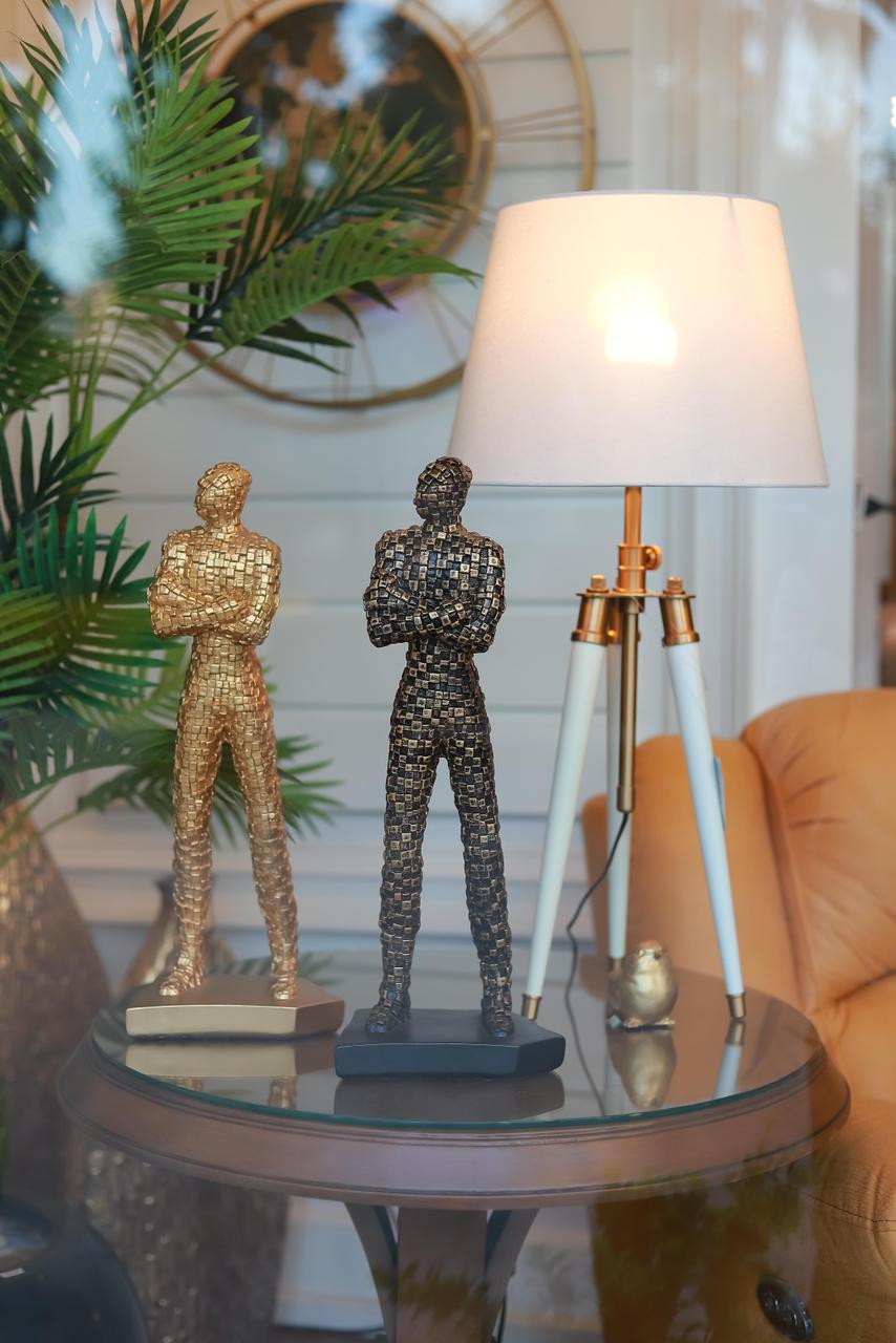 GOLDEN , SILVER STATUE