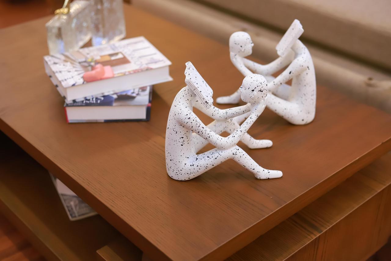 WHITE STATUE WITH IT'S HEAD